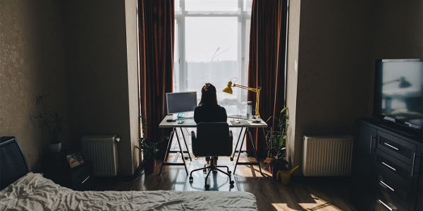 woman working on laptop at home. telework. freelance concept